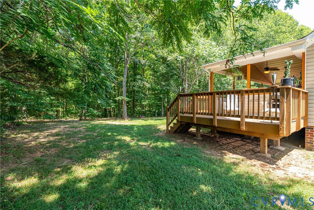 197 Goshen Road Cumberland, VA 23040 - Photo 52 of 70 Expansive wooden deck with a covered overhead stru
