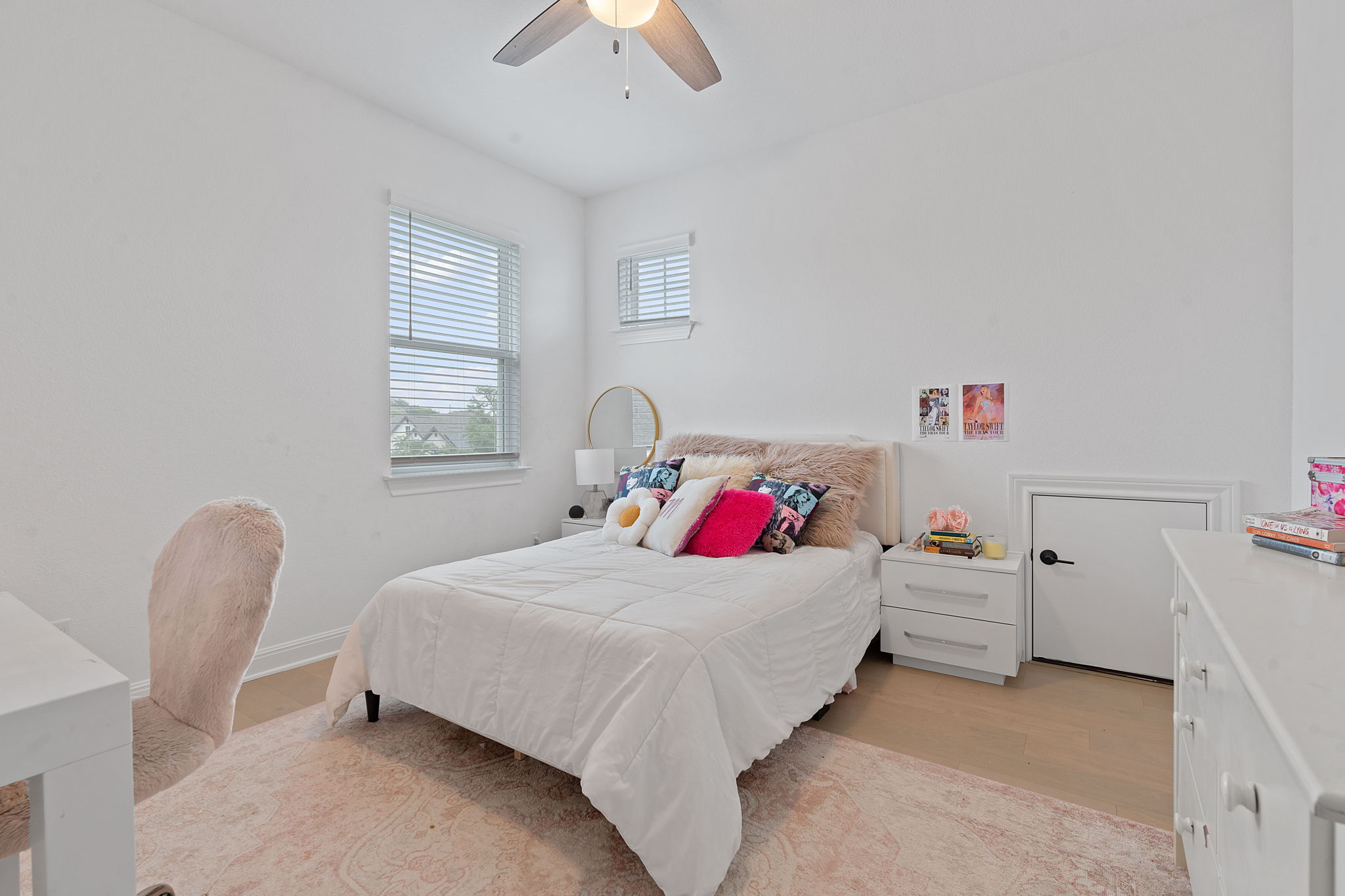 309 Pear Tree Lane Austin, TX 78737 - Photo 32 of 39 a bedroom with a bed and a dresser