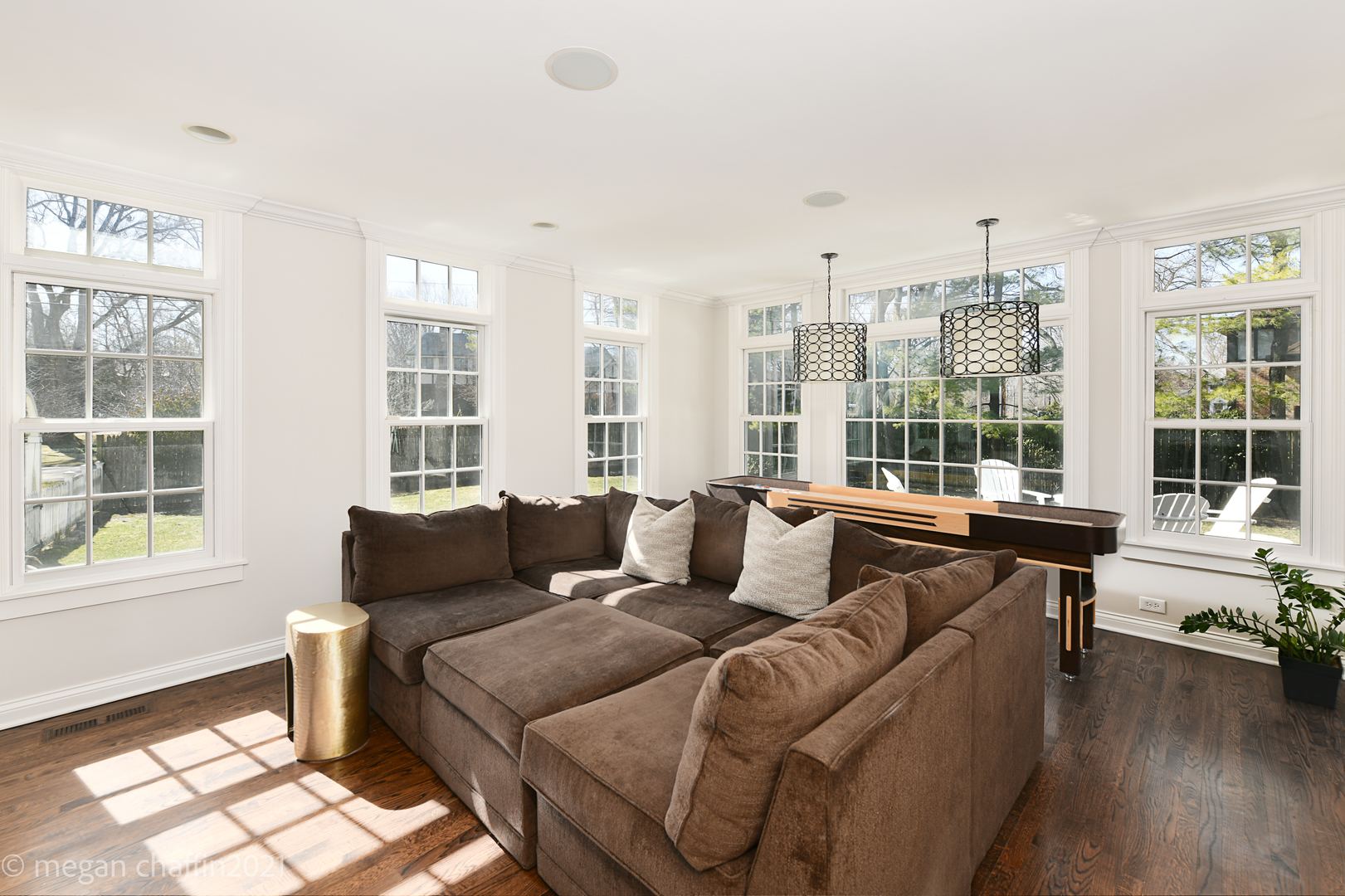 Undisclosed Address Winnetka, IL 60093 - Photo 22 of 38 a living room with furniture and floor to ceiling windows