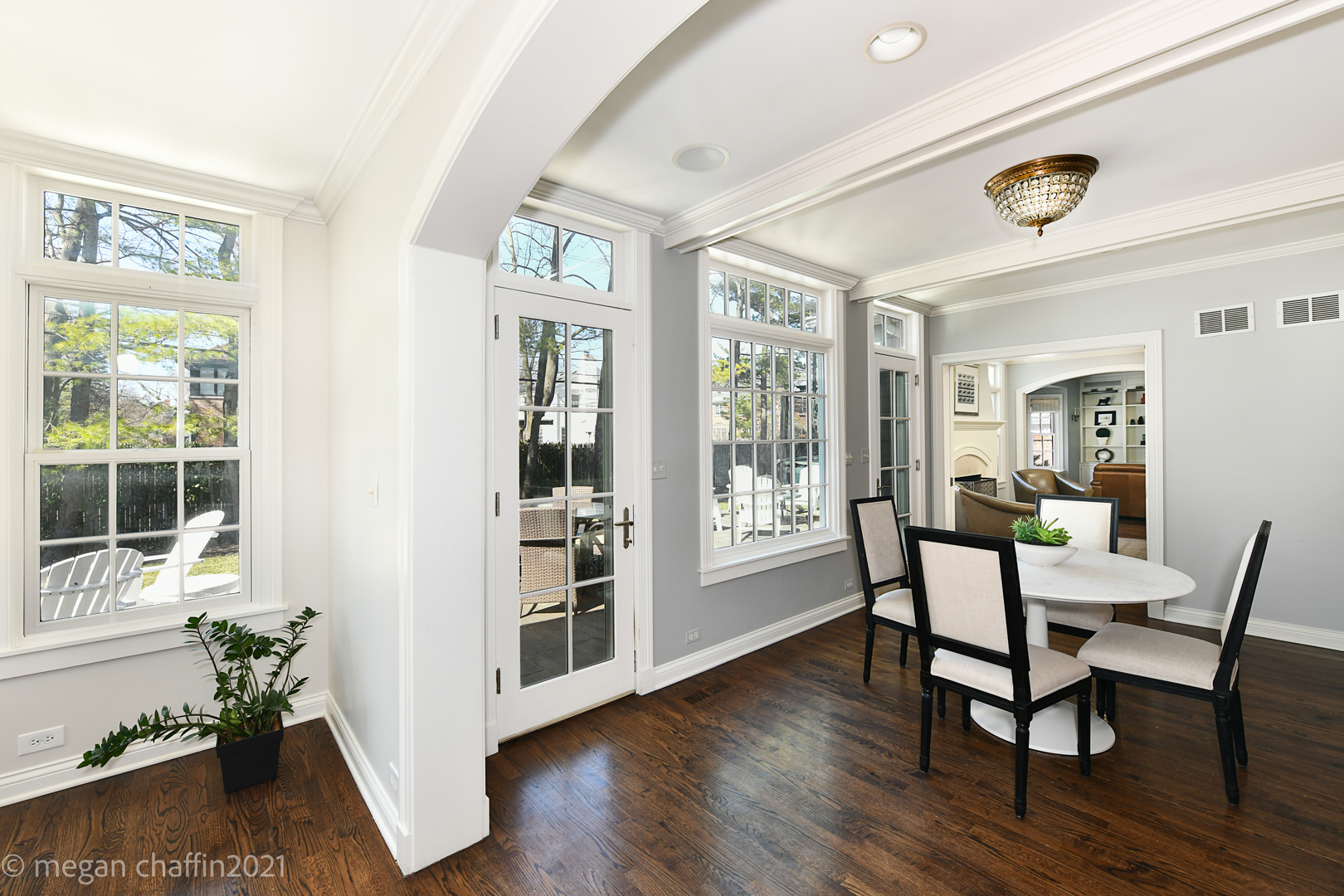 Undisclosed Address Winnetka, IL 60093 - Photo 23 of 38 a dining room with wooden floor and a window