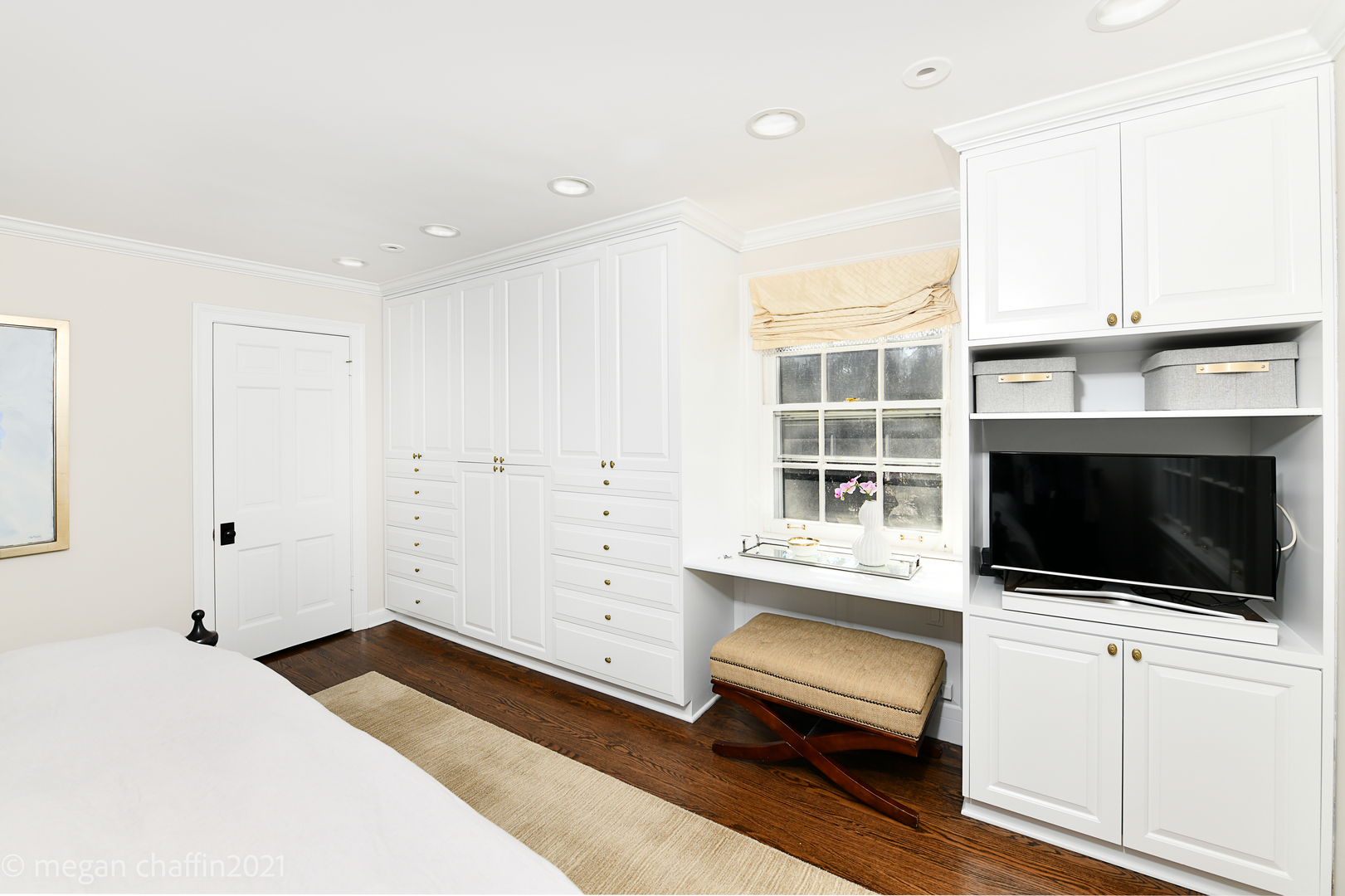 Undisclosed Address Winnetka, IL 60093 - Photo 27 of 38 a bedroom with a bed and a flat screen tv