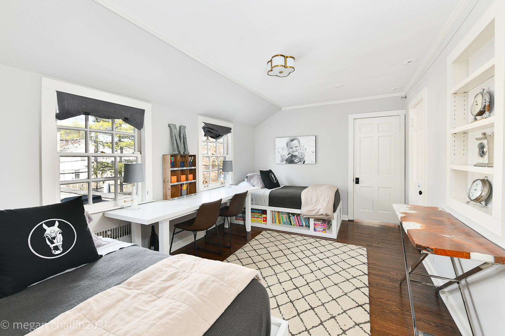 Undisclosed Address Winnetka, IL 60093 - Photo 31 of 38 a living room with a couch and a table