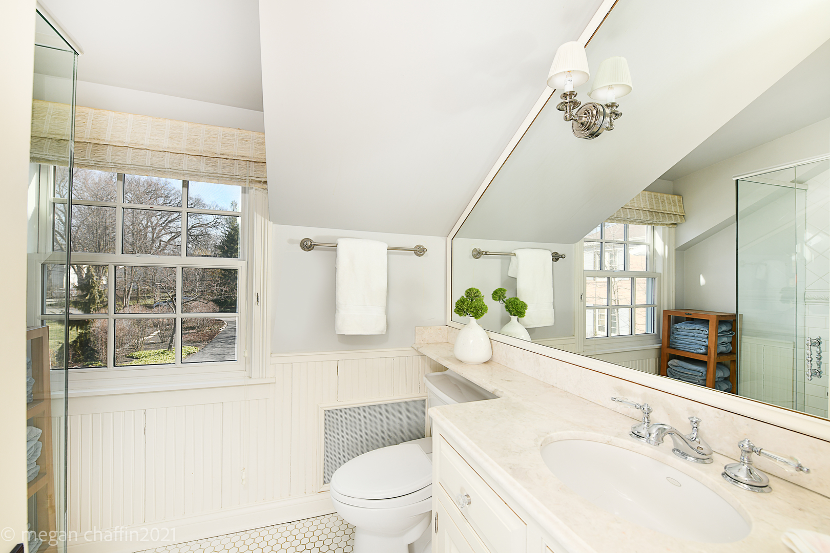 Undisclosed Address Winnetka, IL 60093 - Photo 34 of 38 a bathroom with a granite countertop sink a toilet a mirror a vanity and shower