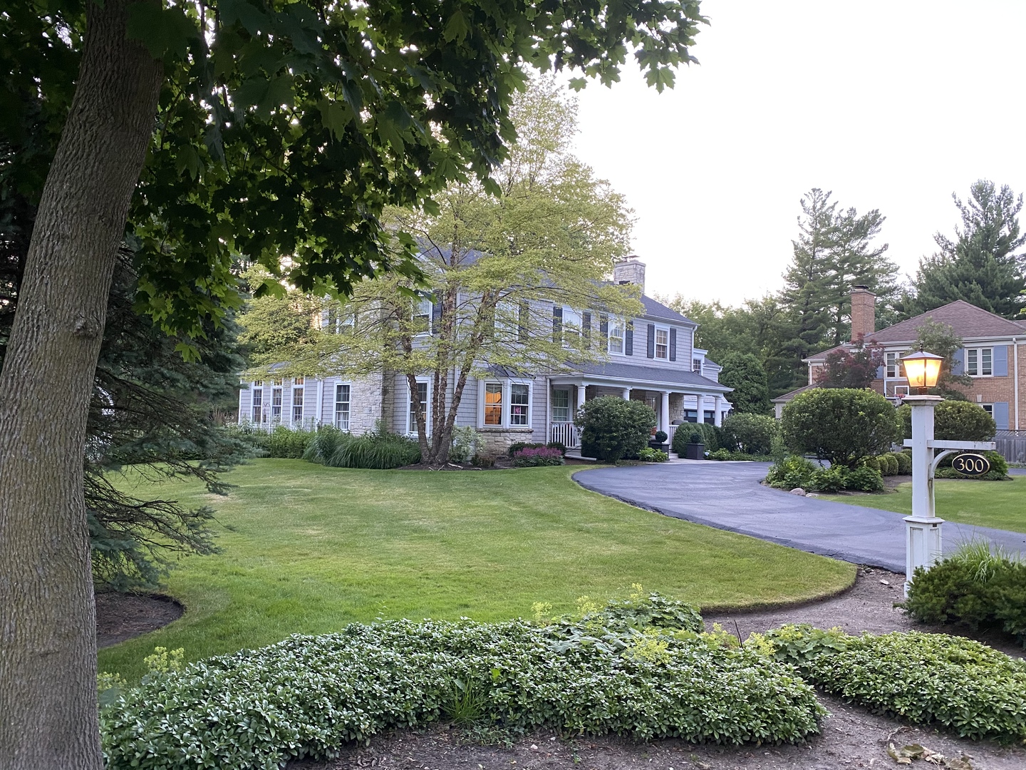 Undisclosed Address Winnetka, IL 60093 - Photo 38 of 38 a front view of a house with a yard