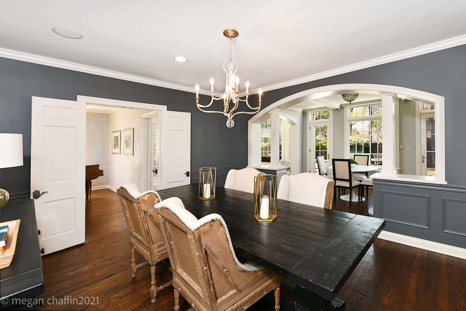 Undisclosed Address Winnetka, IL 60093 - Photo 9 of 38 a view of a dining room with furniture a chandelier and wooden floor
