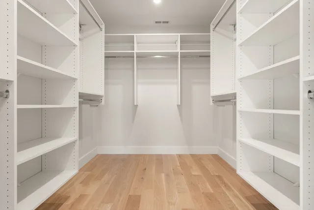 a view of an empty walk in closet