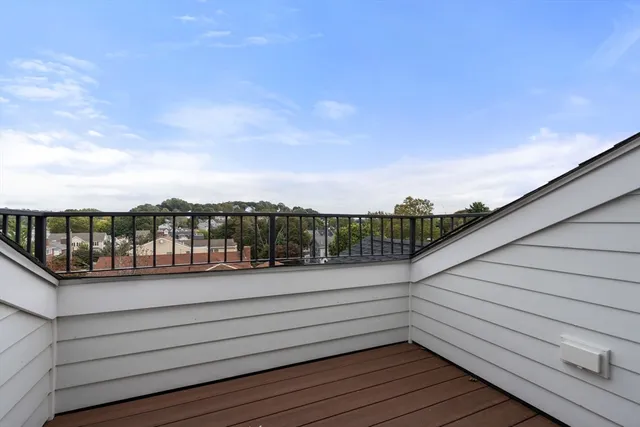 a view of a balcony with city view