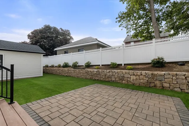 a view of a back yard of the house