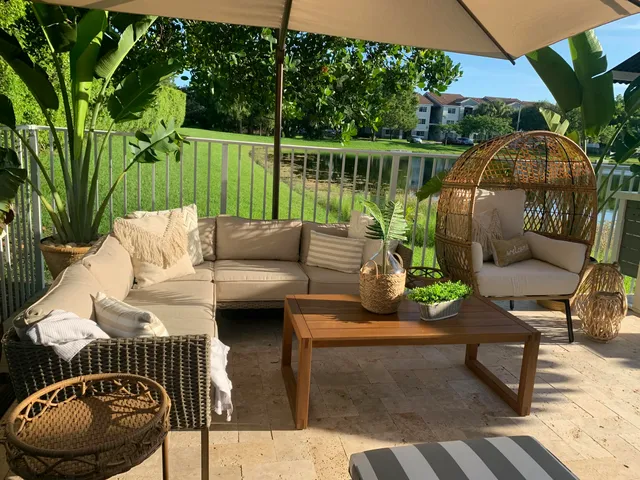 a view of a couches on the roof deck