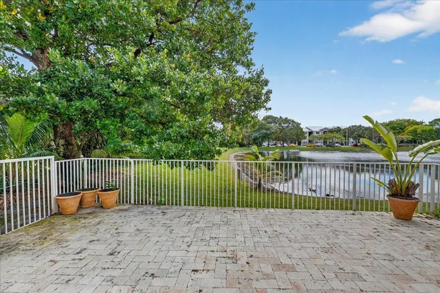 a backyard of a house with barbeque oven