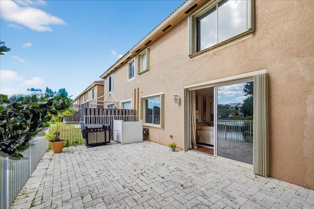 a balcony view with a garden space