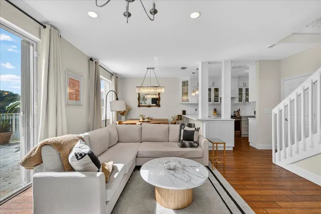 a living room with furniture and a table
