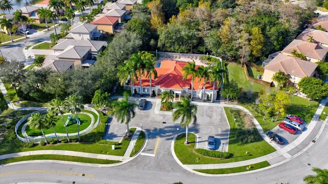an aerial view of a house with outdoor space