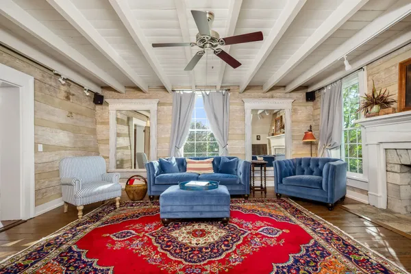 a living room with furniture or couch and a flat screen tv