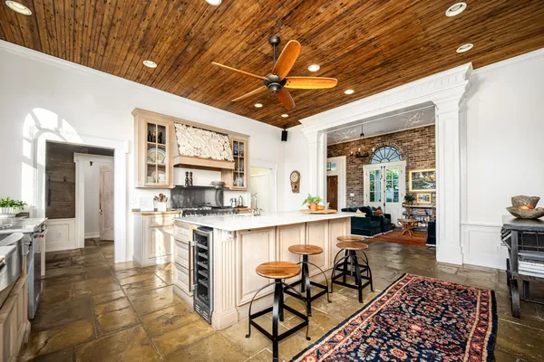 a kitchen with a stove and a cabinet