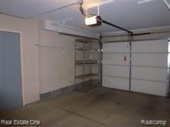 3521 Oakmonte Boulevard, Unit 74 Rochester, MI 48306 - Photo 21 of 31 !-Car Garage