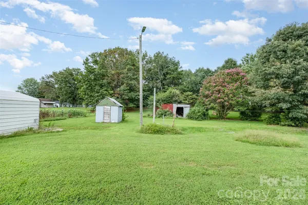 a fire hydrant in the middle of a field