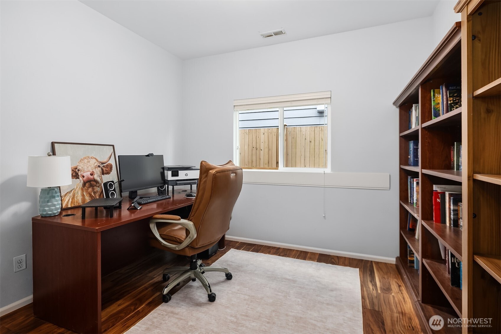4119 167th Place Southeast Bothell, WA 98012 - Photo 15 of 39 a view of a workspace with furniture and a window