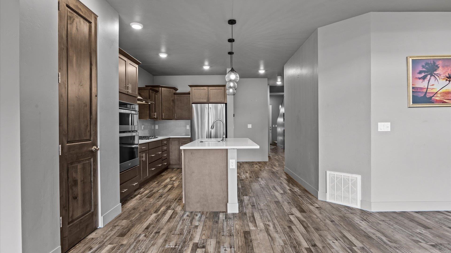 380 West Ridges Boulevard, Unit C Grand Junction, CO 81507 - Photo 11 of 42 a view of a kitchen from the hallway