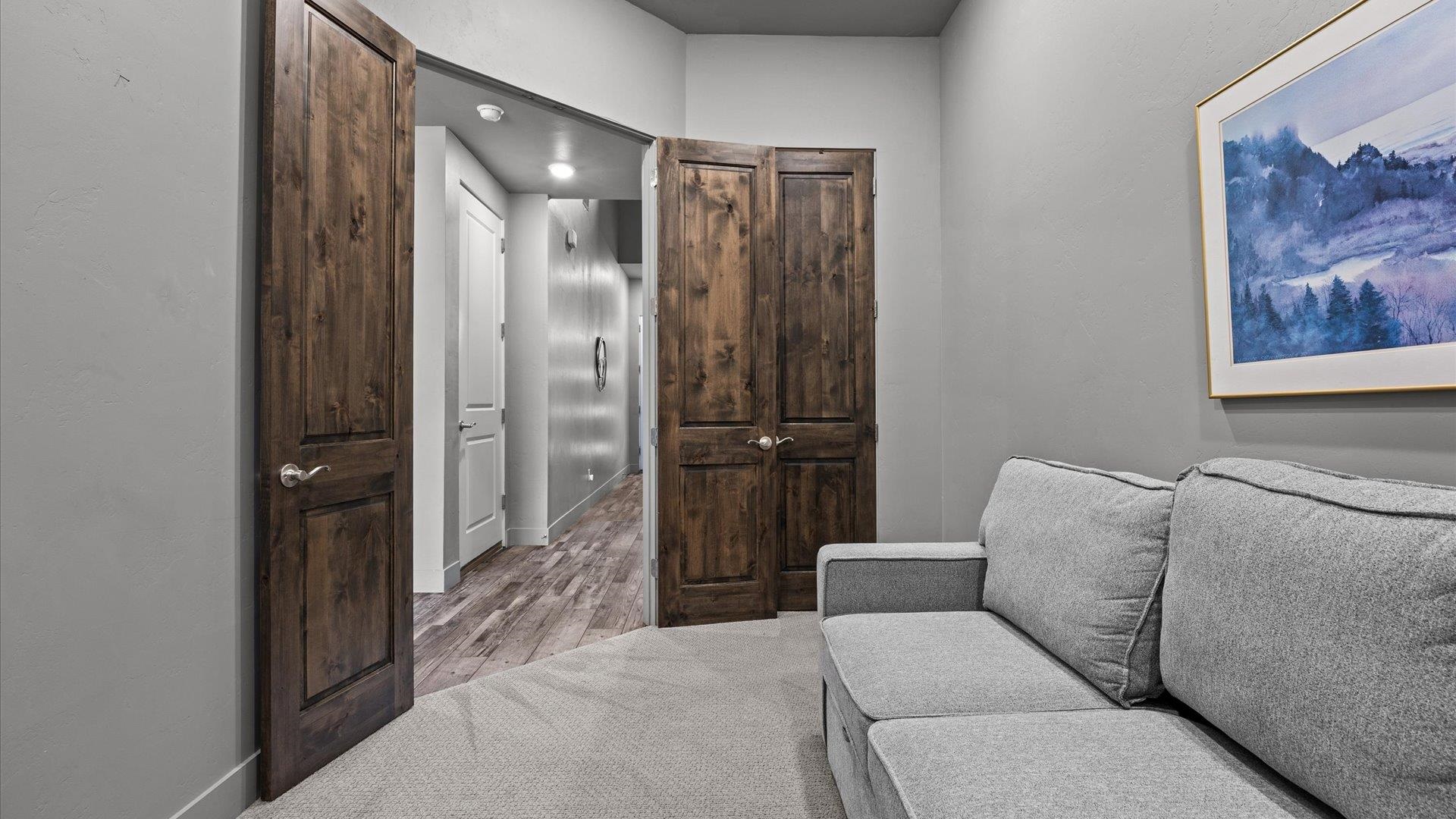 380 West Ridges Boulevard, Unit C Grand Junction, CO 81507 - Photo 15 of 42 a living room with a couch and a walk in closet