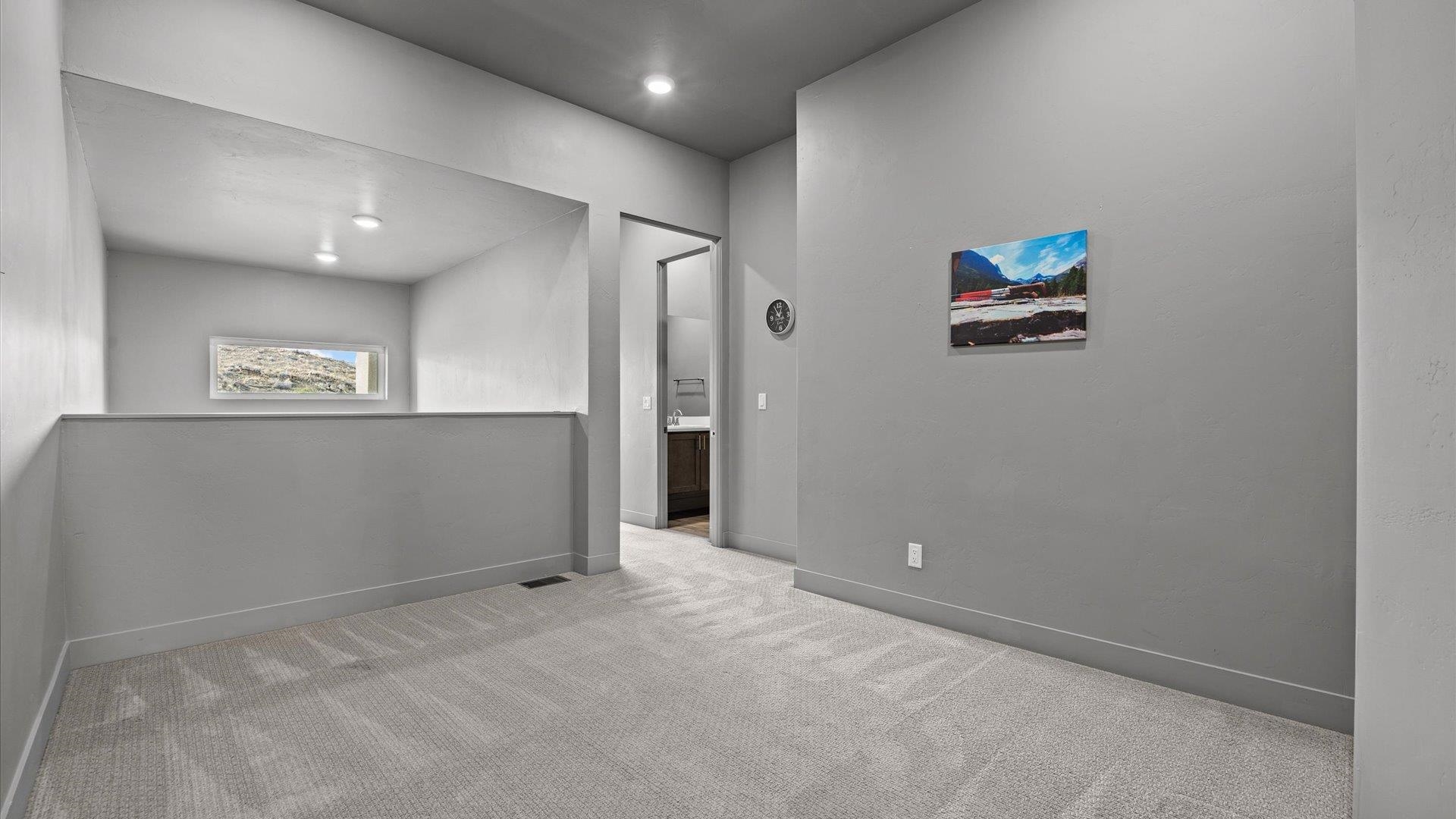 380 West Ridges Boulevard, Unit C Grand Junction, CO 81507 - Photo 26 of 42 an empty room with windows and entrance