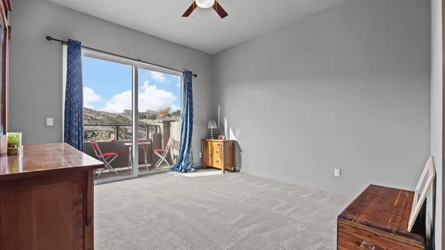 a bathroom with a glass shower door