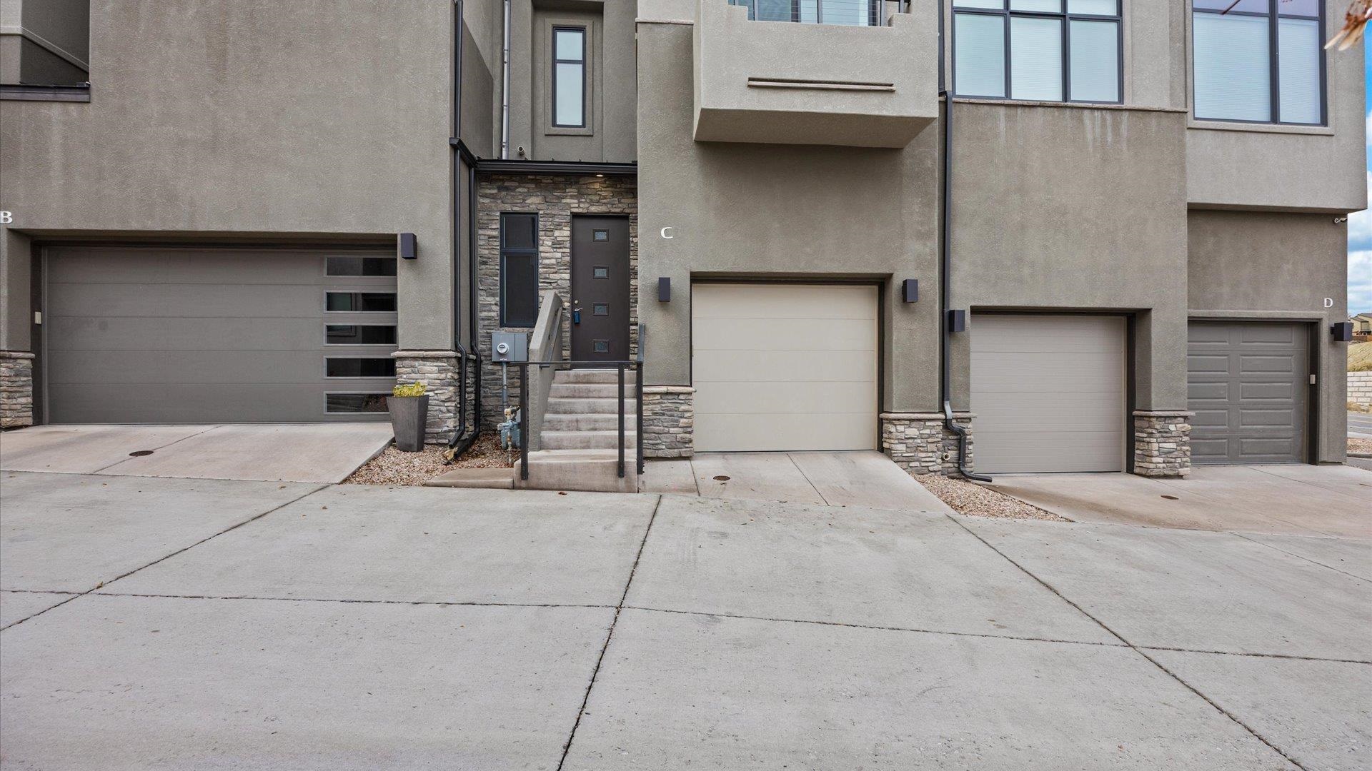380 West Ridges Boulevard, Unit C Grand Junction, CO 81507 - Photo 5 of 42 a view of a house with a garage
