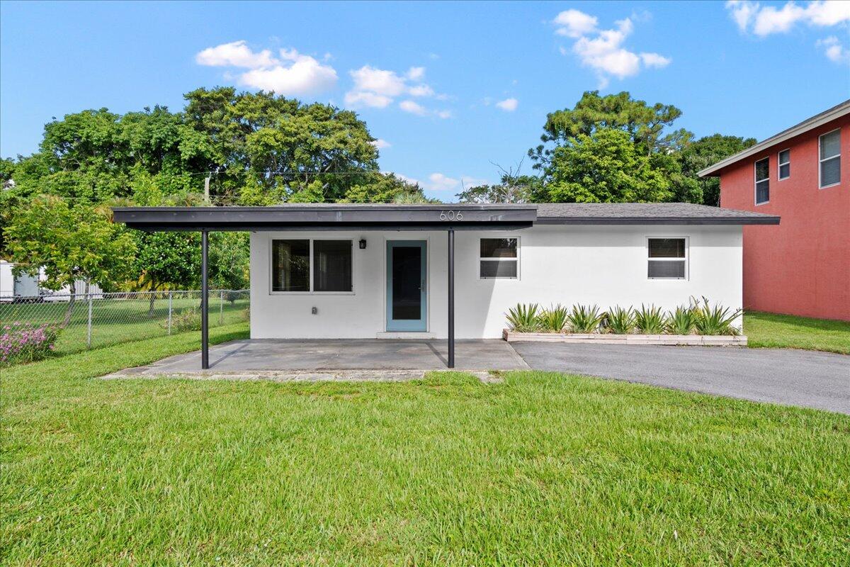 a house view with a garden space