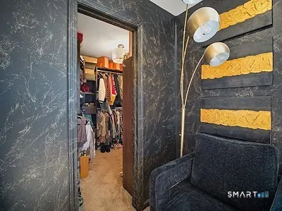 a bathroom with a bathtub sink and mirror