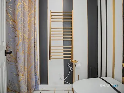 a lobby with furniture and rug