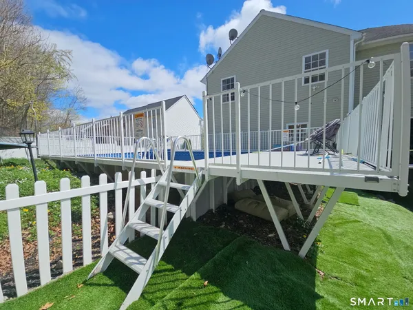 a view of a two chairs in a yard