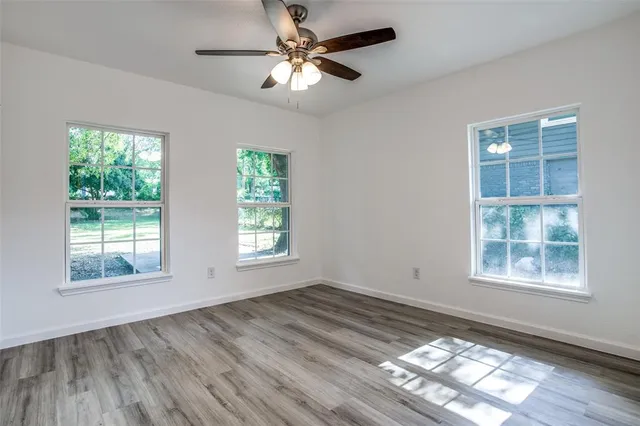 a kitchen with granite countertop a stove and a sink
