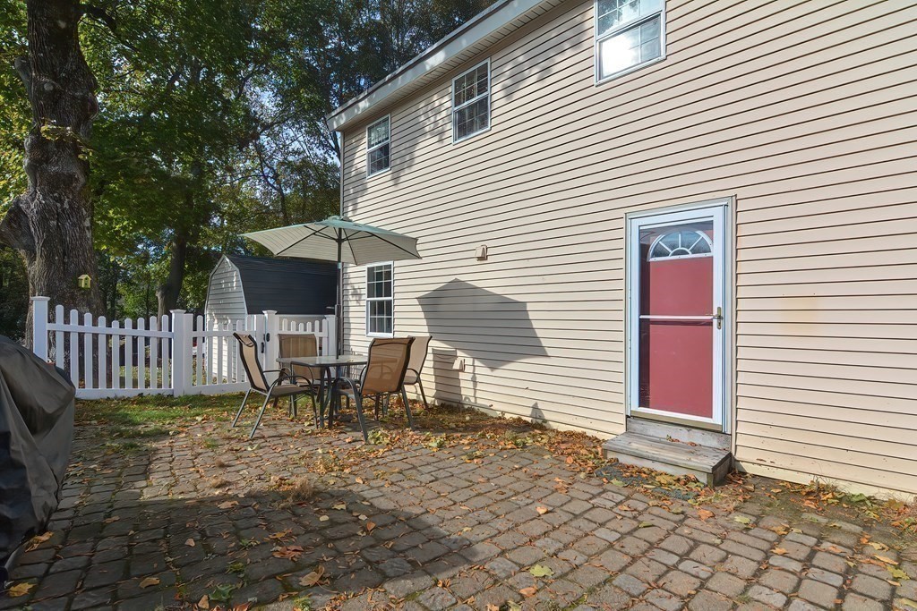9 Bridge Street Grafton, MA 01536 - Photo 27 of 34 a view of a house with a patio