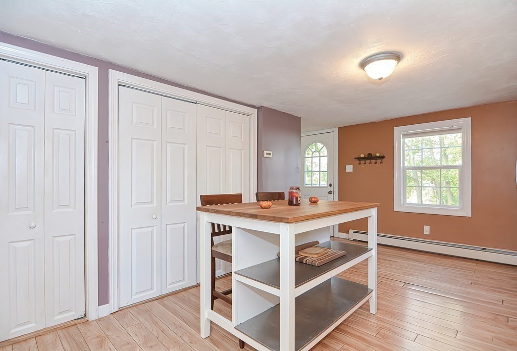 9 Bridge Street Grafton, MA 01536 - Photo 7 of 34 a view of a workspace with furniture and wooden floor