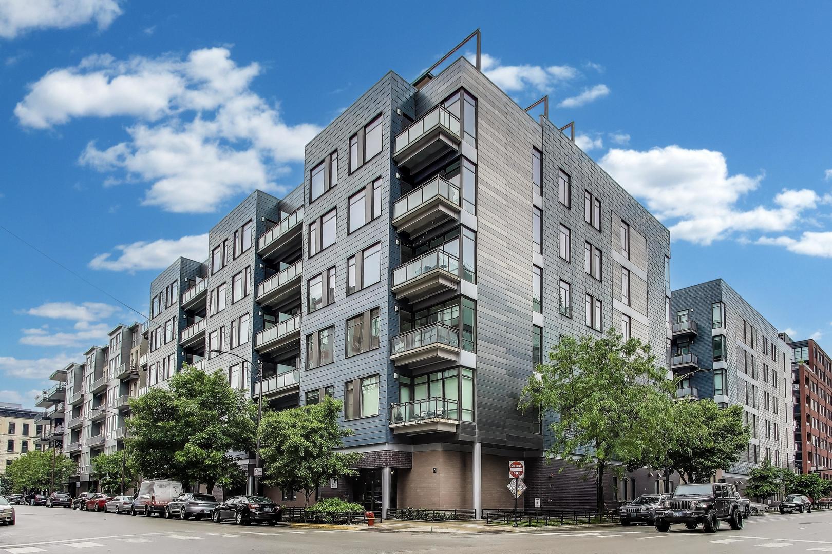 a view of a building and a street
