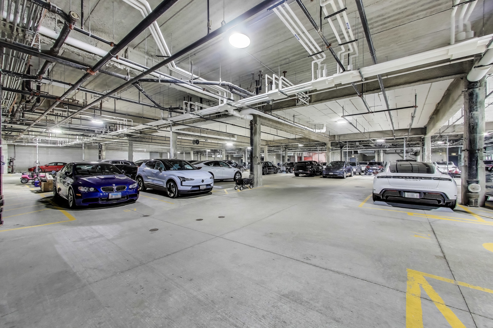 36 North Carpenter Street, Unit 4S Chicago, IL 60607 - Photo 32 of 32 a view of parking garage with cars and other