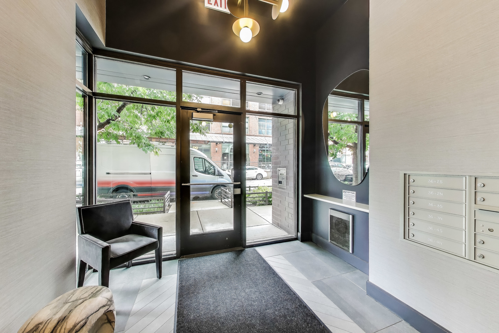 36 North Carpenter Street, Unit 4S Chicago, IL 60607 - Photo 4 of 32 a living room with furniture and a window