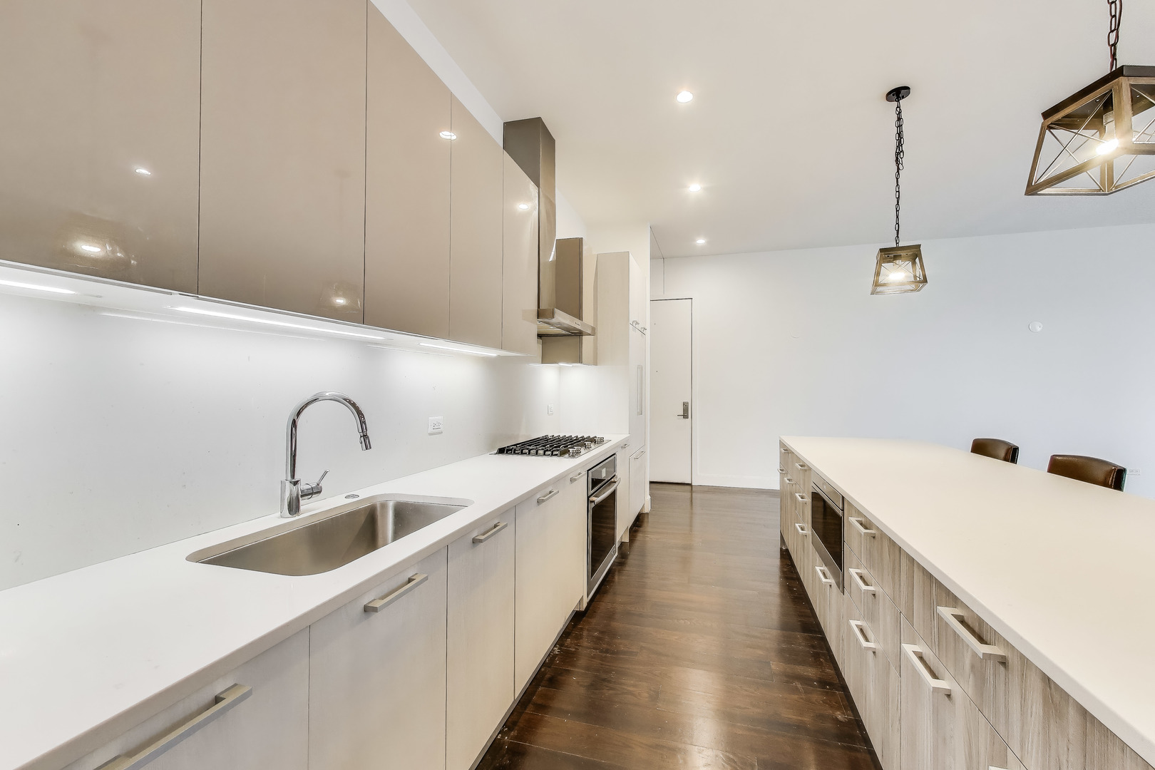 36 North Carpenter Street, Unit 4S Chicago, IL 60607 - Photo 10 of 32 a kitchen with a sink a faucet and appliances