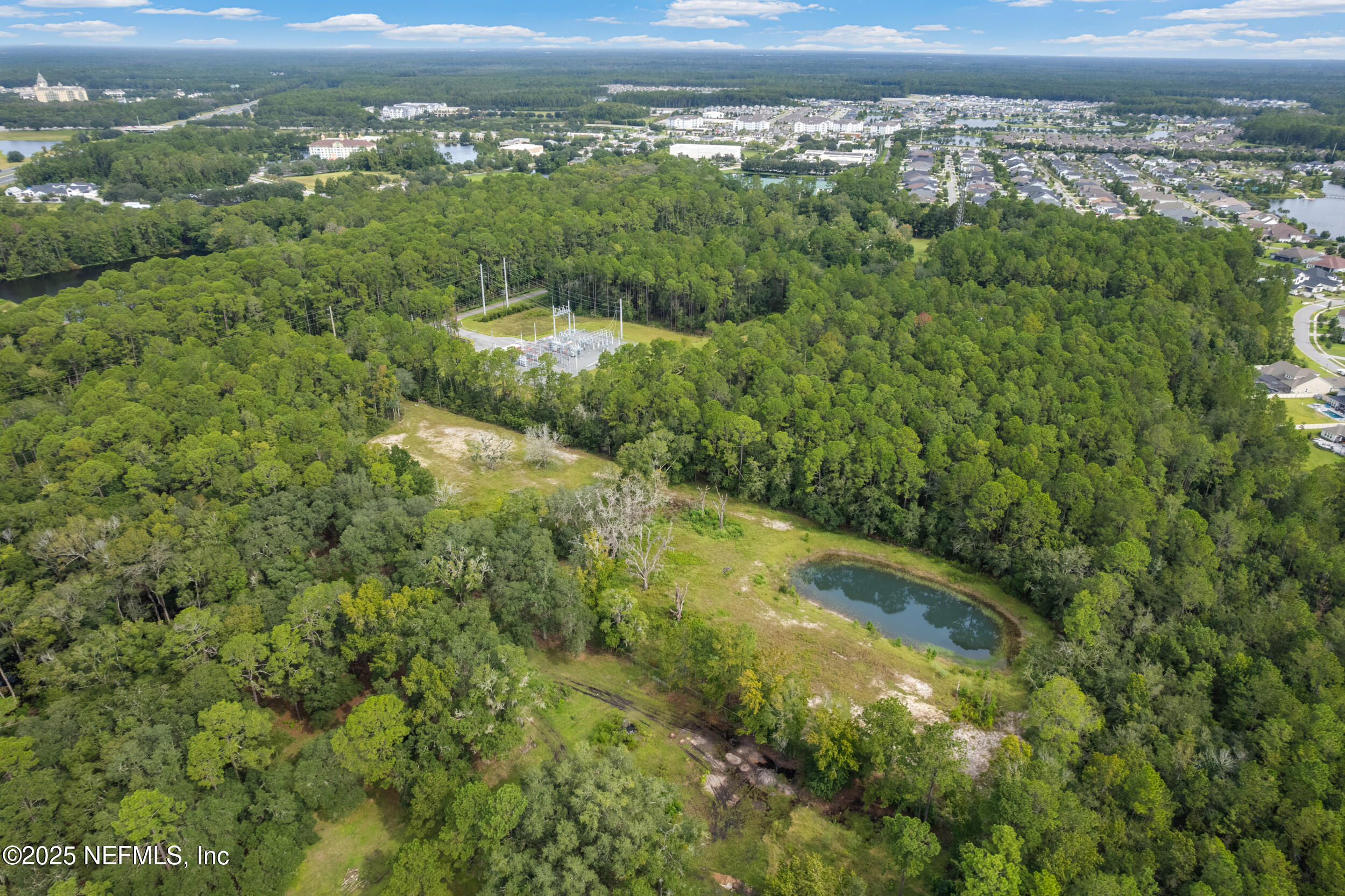4600 North Francis Road St. Augustine, FL 32095 - Photo 10 of 15 a view of a lake with a city