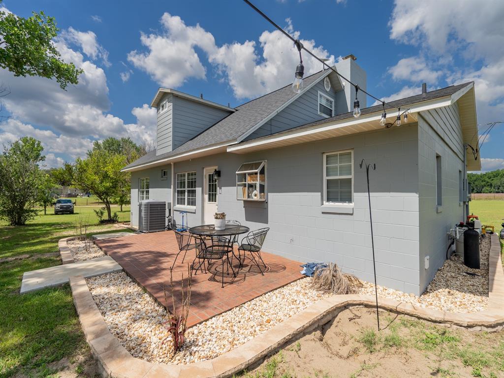 4381 Northeast 105th Place Anthony, FL 32617 - Photo 36 of 49 a view of a house with backyard