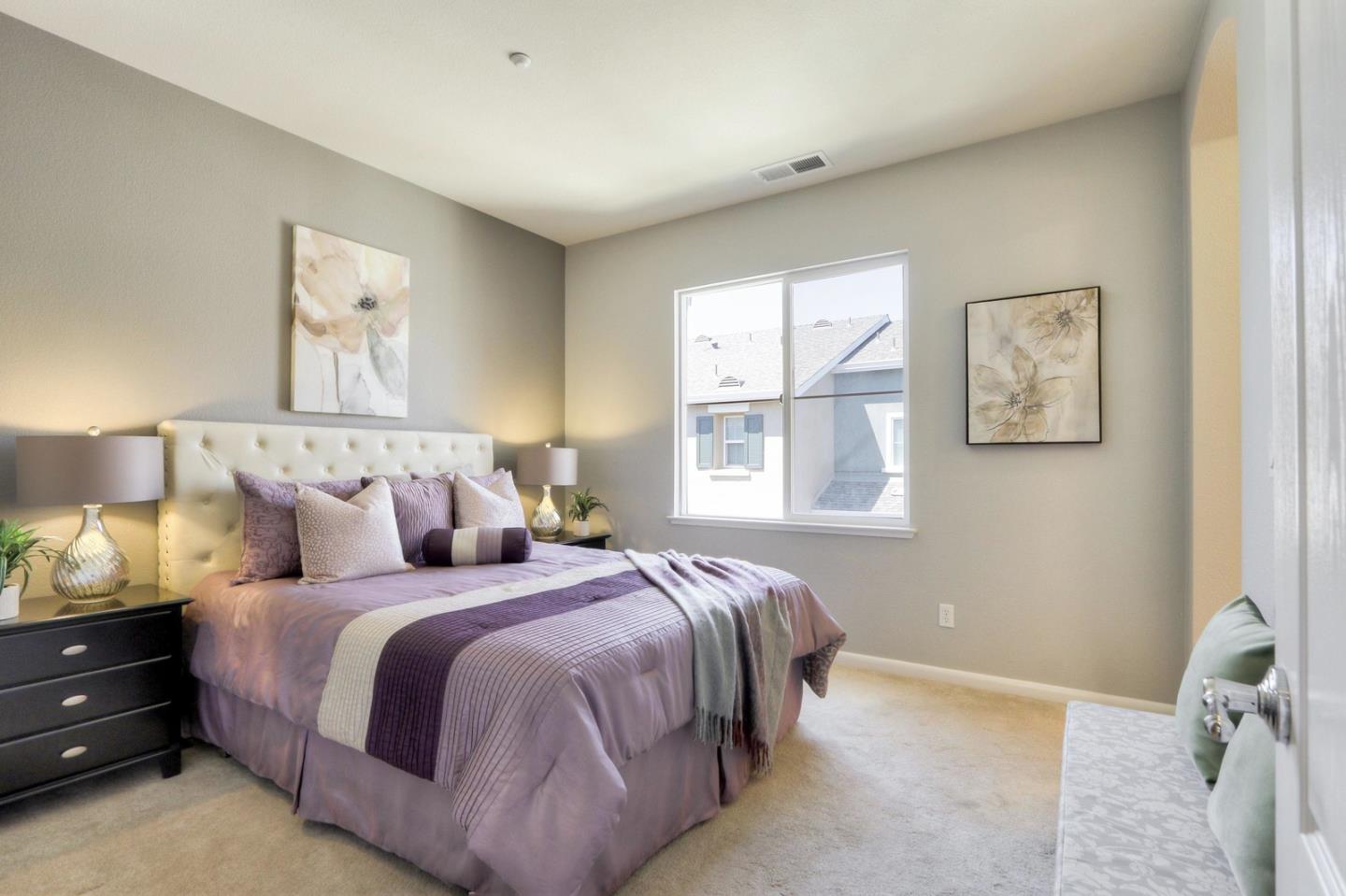543 Saco Terrace Sunnyvale, CA 94089 - Photo 17 of 50 a bedroom with a bed and a window