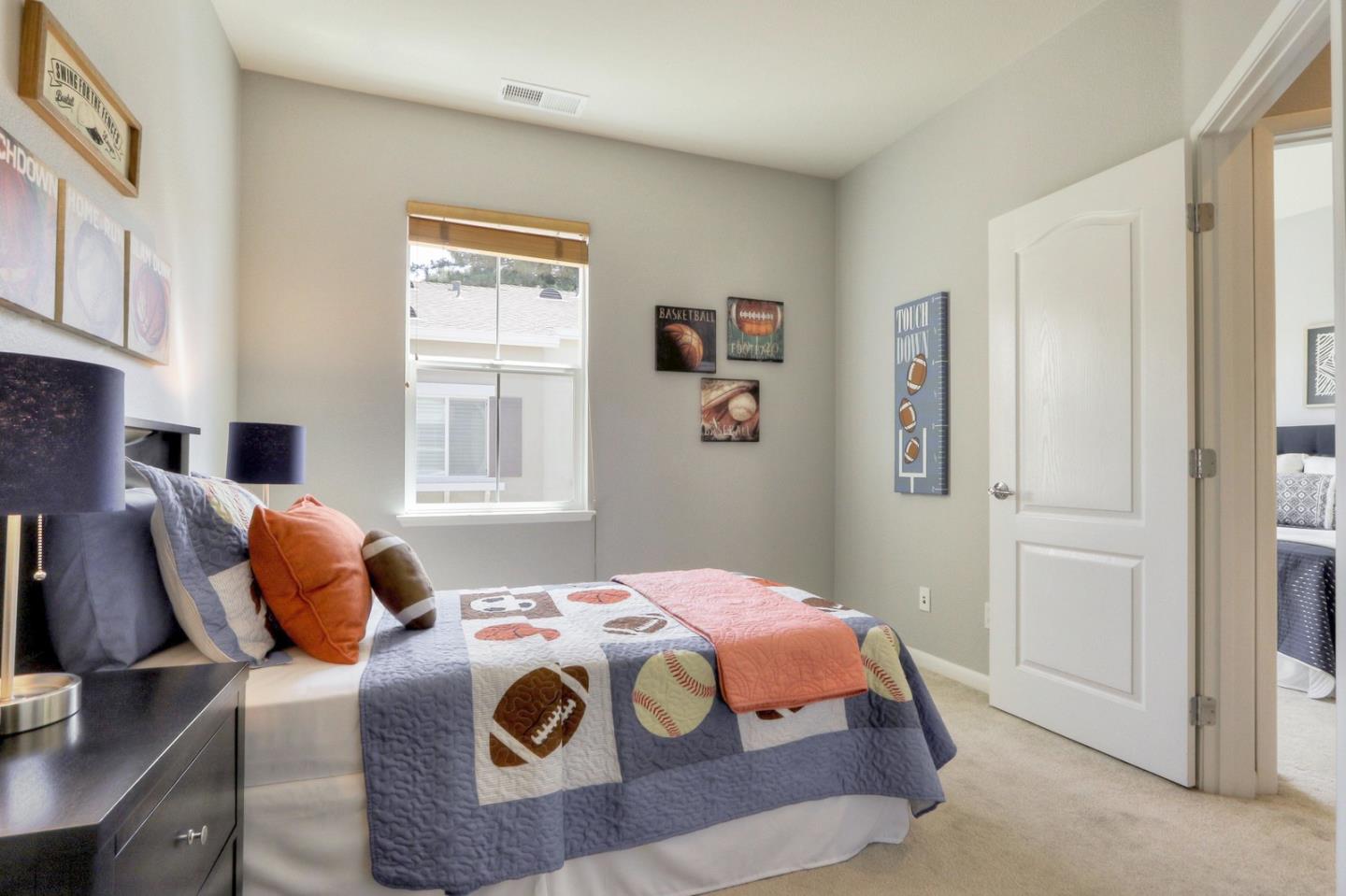 543 Saco Terrace Sunnyvale, CA 94089 - Photo 27 of 50 a bedroom with a bed and a window