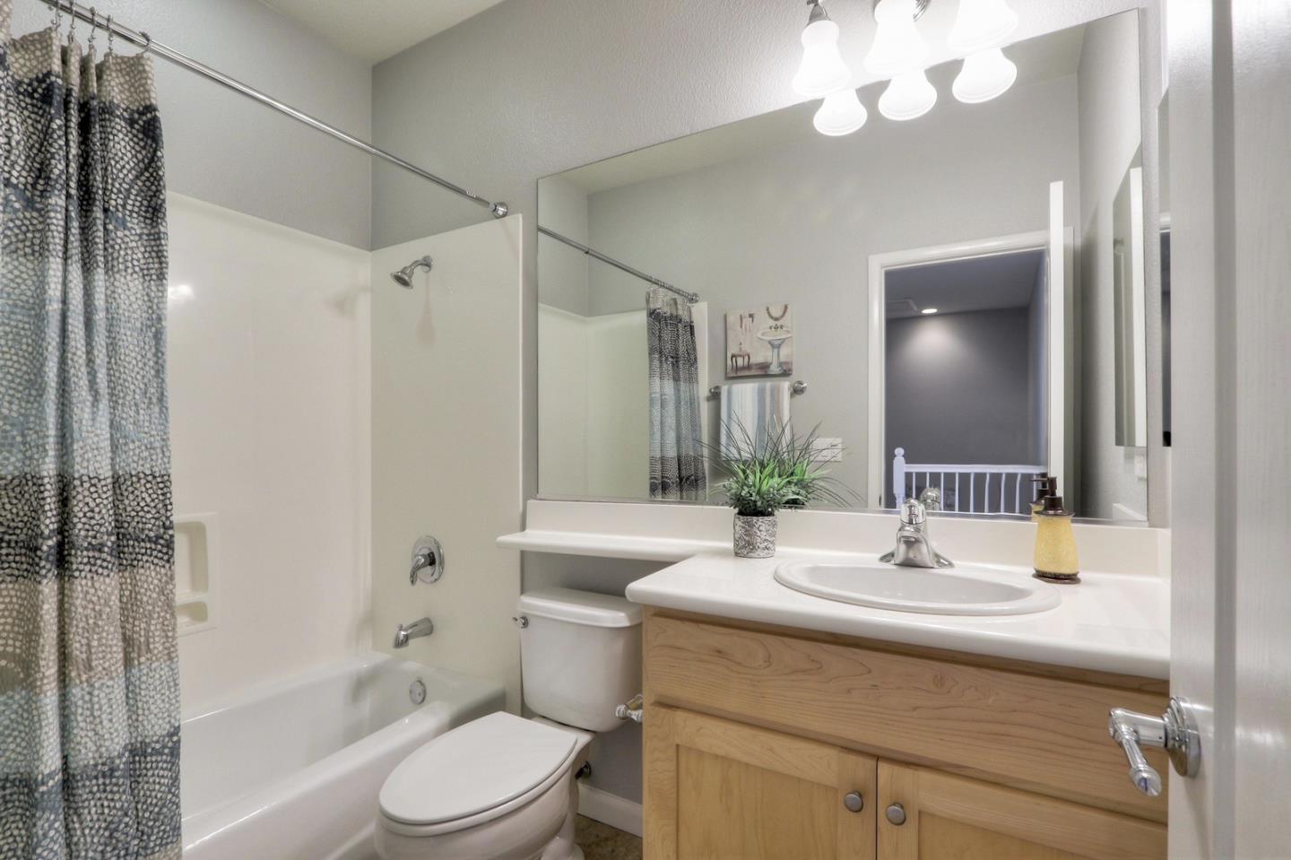 543 Saco Terrace Sunnyvale, CA 94089 - Photo 32 of 50 a bathroom with a sink a toilet and shower