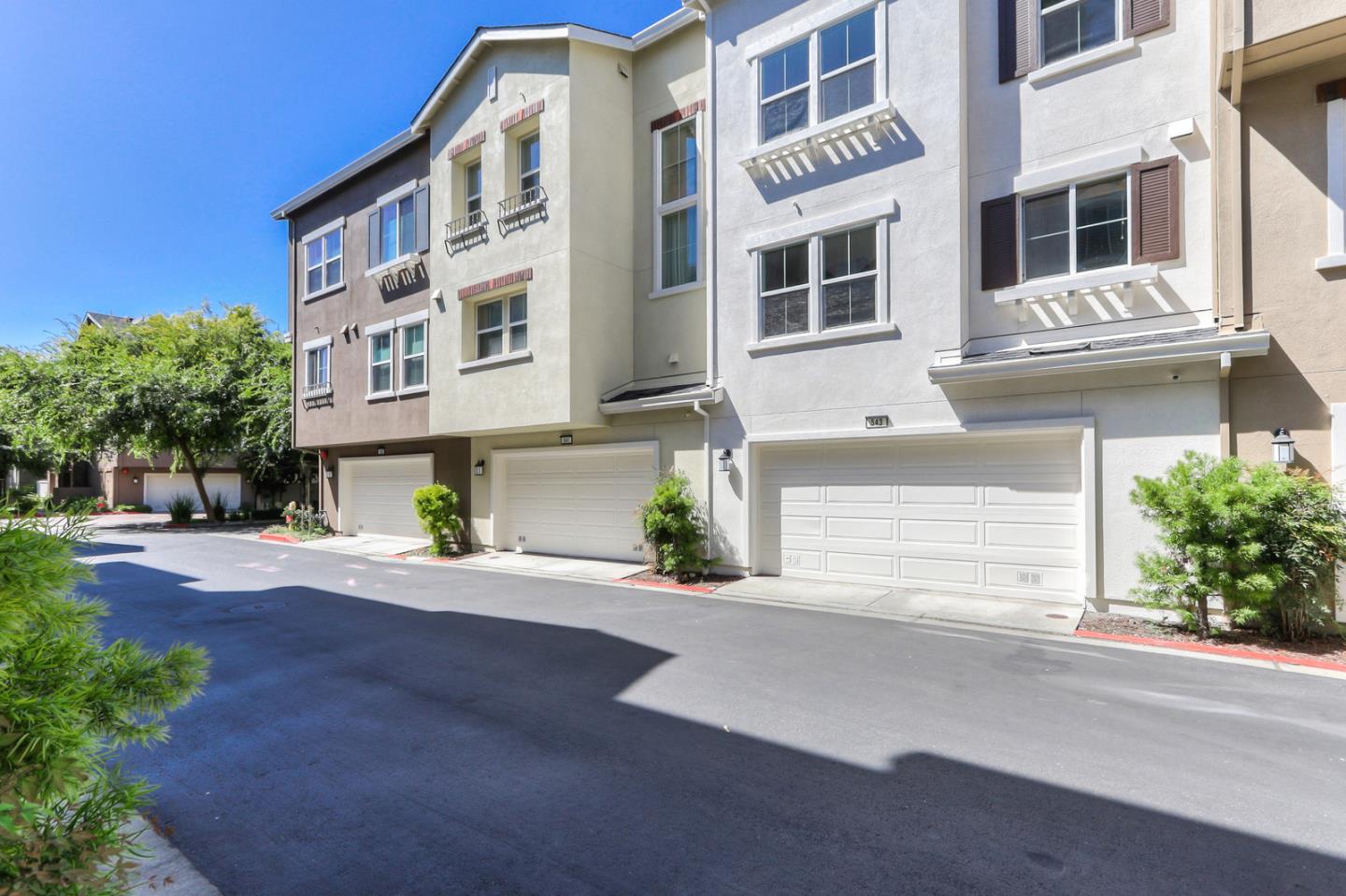 543 Saco Terrace Sunnyvale, CA 94089 - Photo 42 of 50 a front view of a house with a yard and a garage