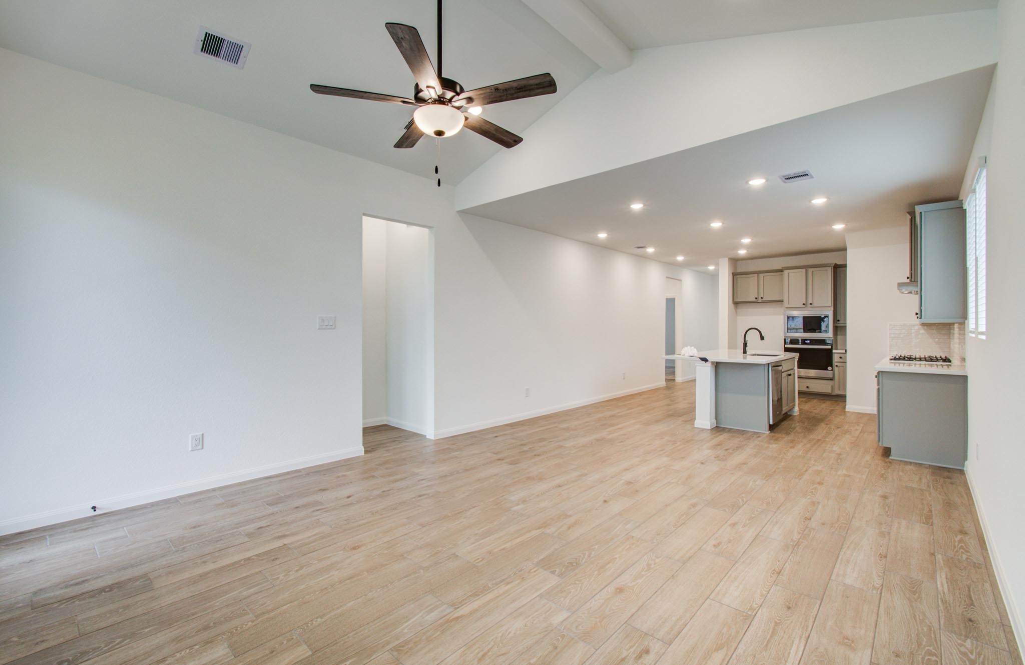 7231 Yarrow Blossom Court Katy, TX 77493 - Photo 19 of 49 a view of kitchen with a sink and refrigerator