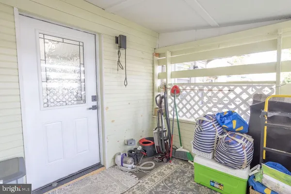 a view of a backyard with sitting area