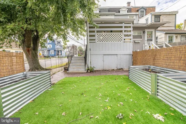 a view of a garden with wooden floor