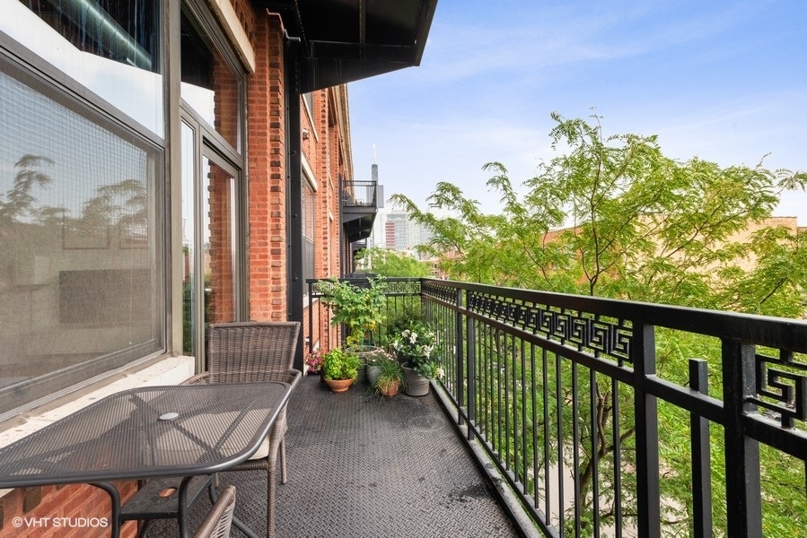 1040 West Adams Street, Unit 336 Chicago, IL 60607 - Photo 16 of 23 a view of balcony with furniture