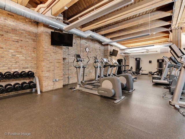 1040 West Adams Street, Unit 336 Chicago, IL 60607 - Photo 18 of 23 a view of a car in garage