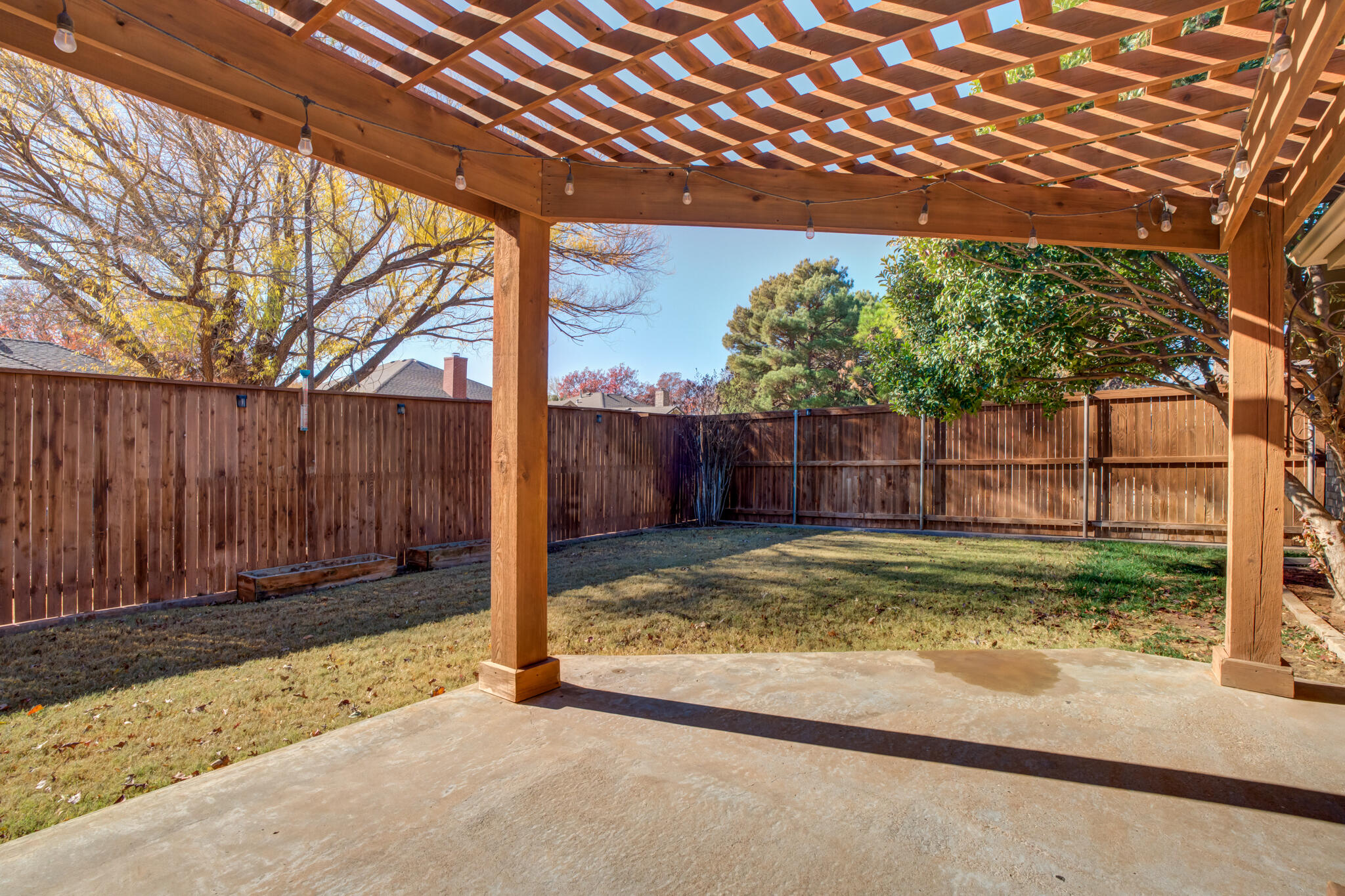 5407 68th Street Lubbock, TX 79424 - Photo 38 of 40 a view of backyard with wooden fence